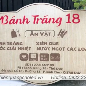 Logo go treo cua hang